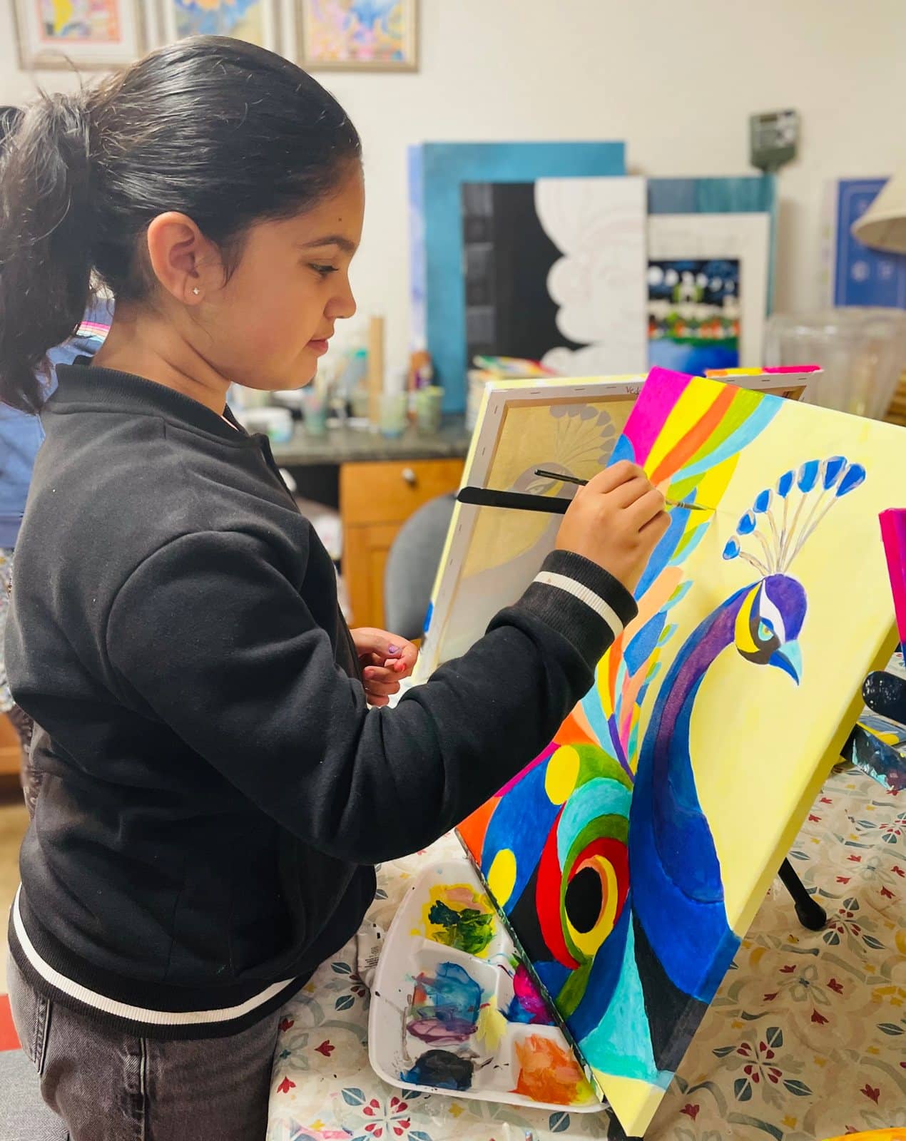 Student artwork and creative process at Imagination Arts.