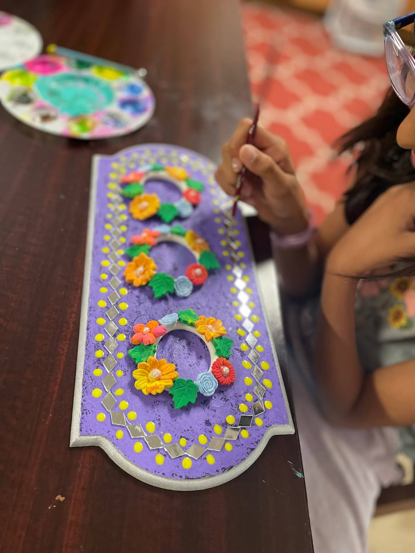 Student artwork and creative process at Imagination Arts.