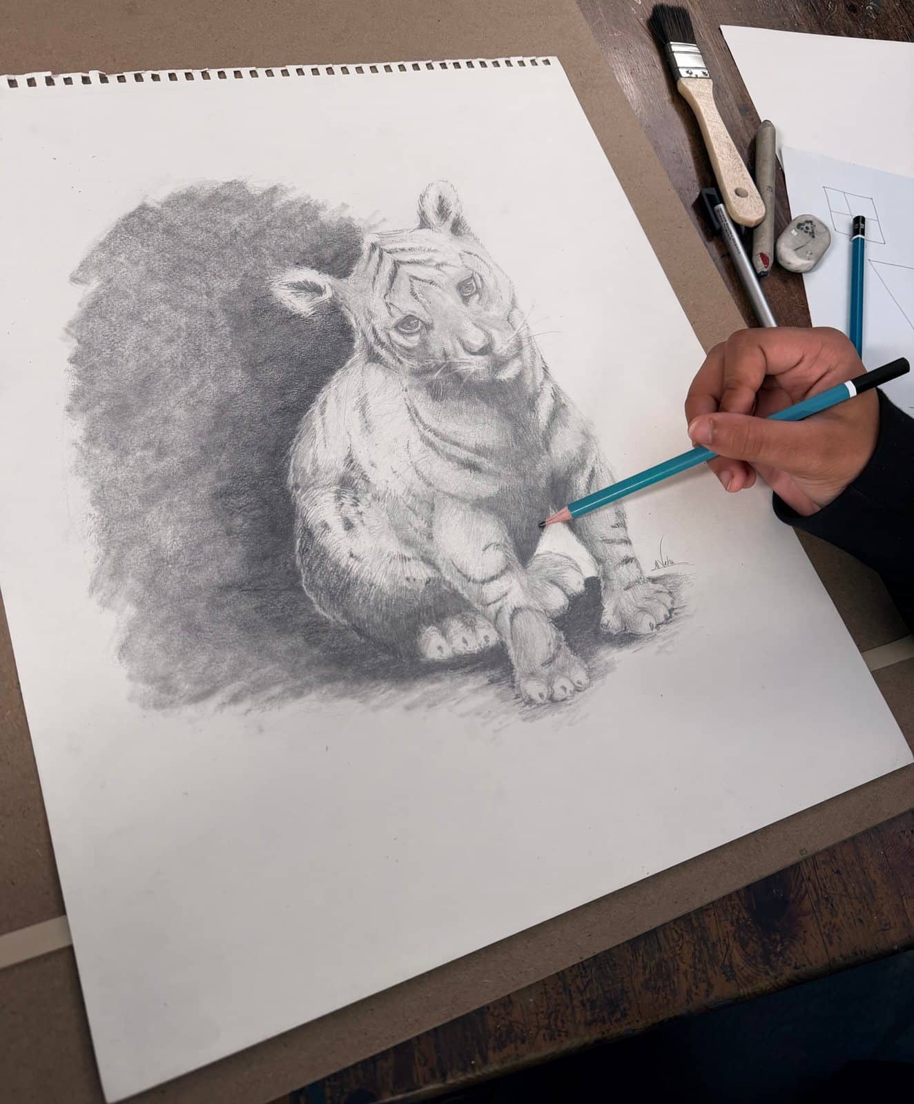 Student artwork and creative process at Imagination Arts.