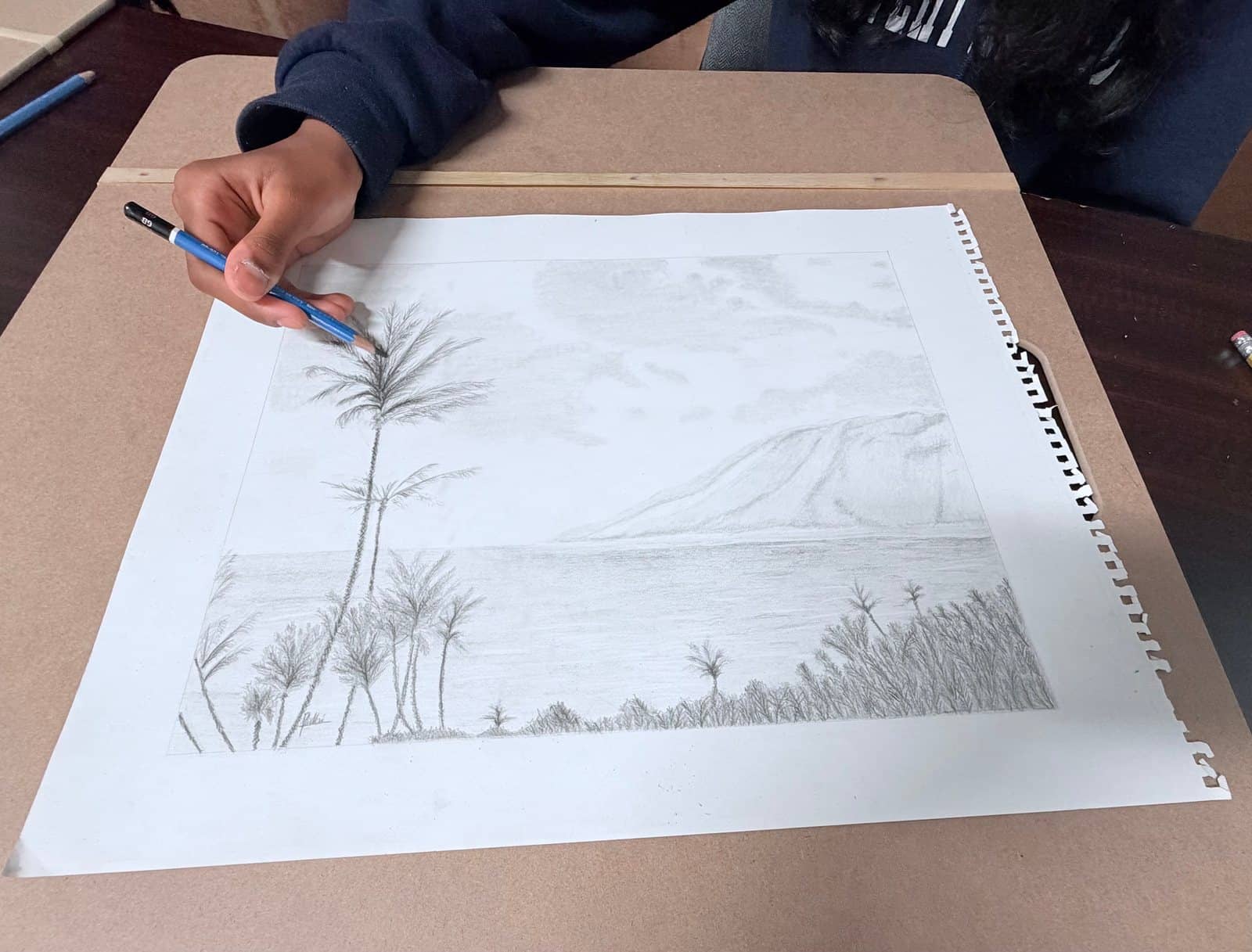 Student artwork and creative process at Imagination Arts.