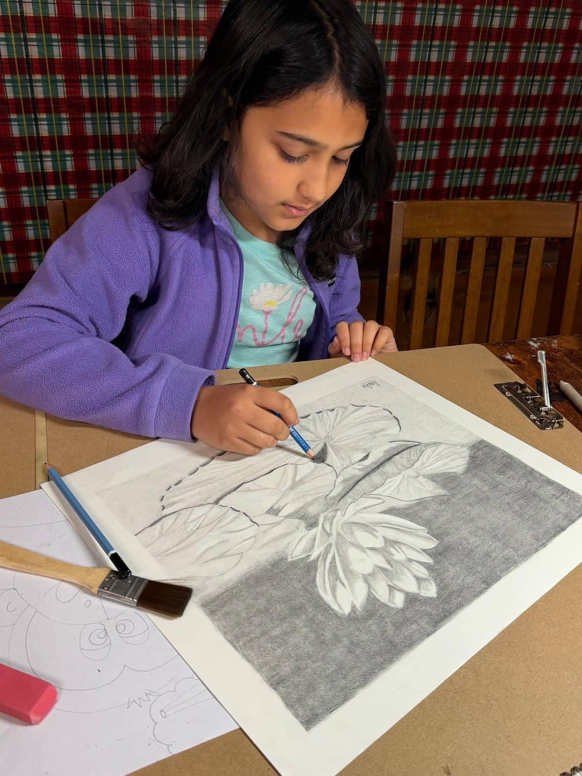 Student artwork and creative process at Imagination Arts.