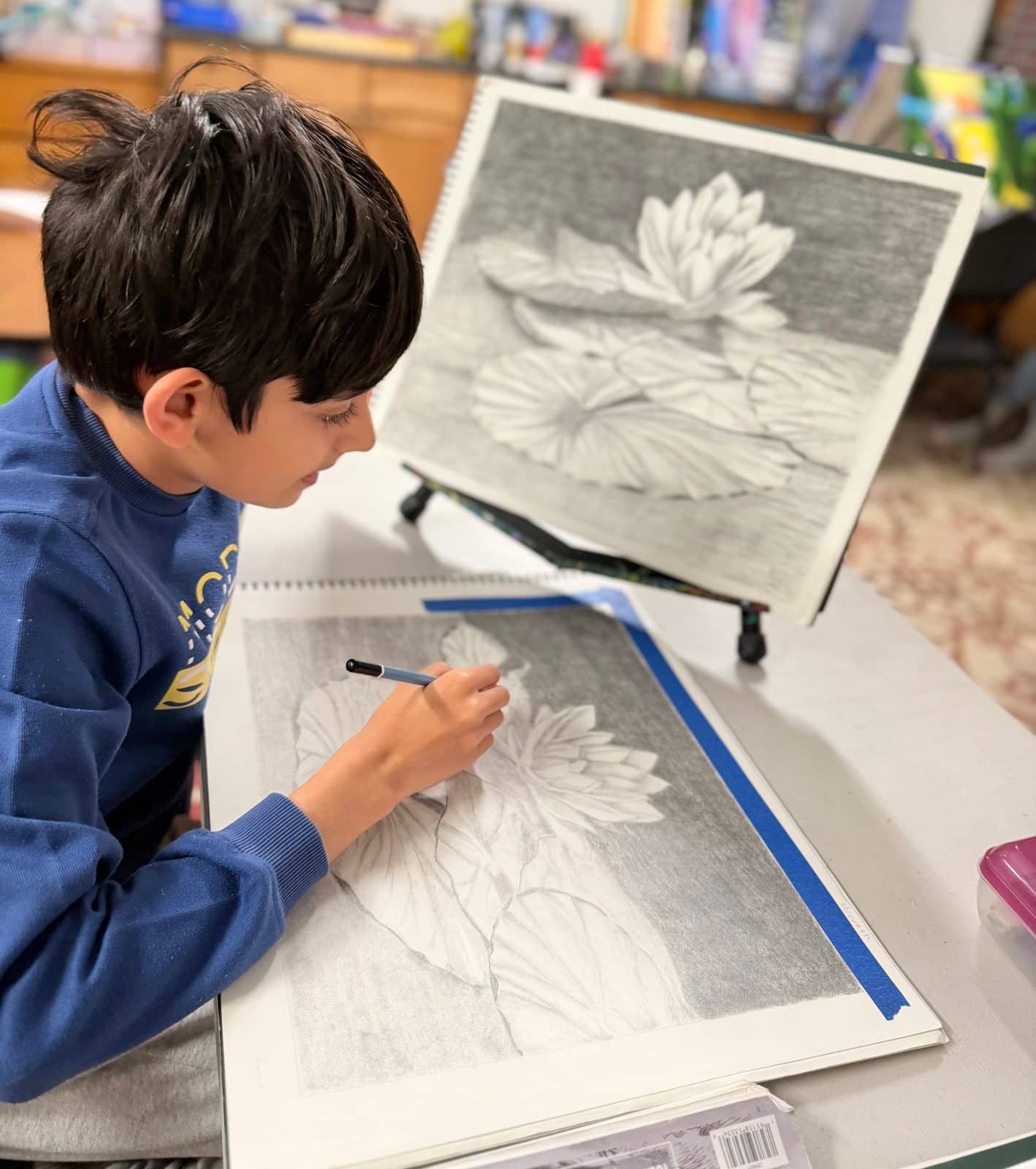 Student artwork and creative process at Imagination Arts.