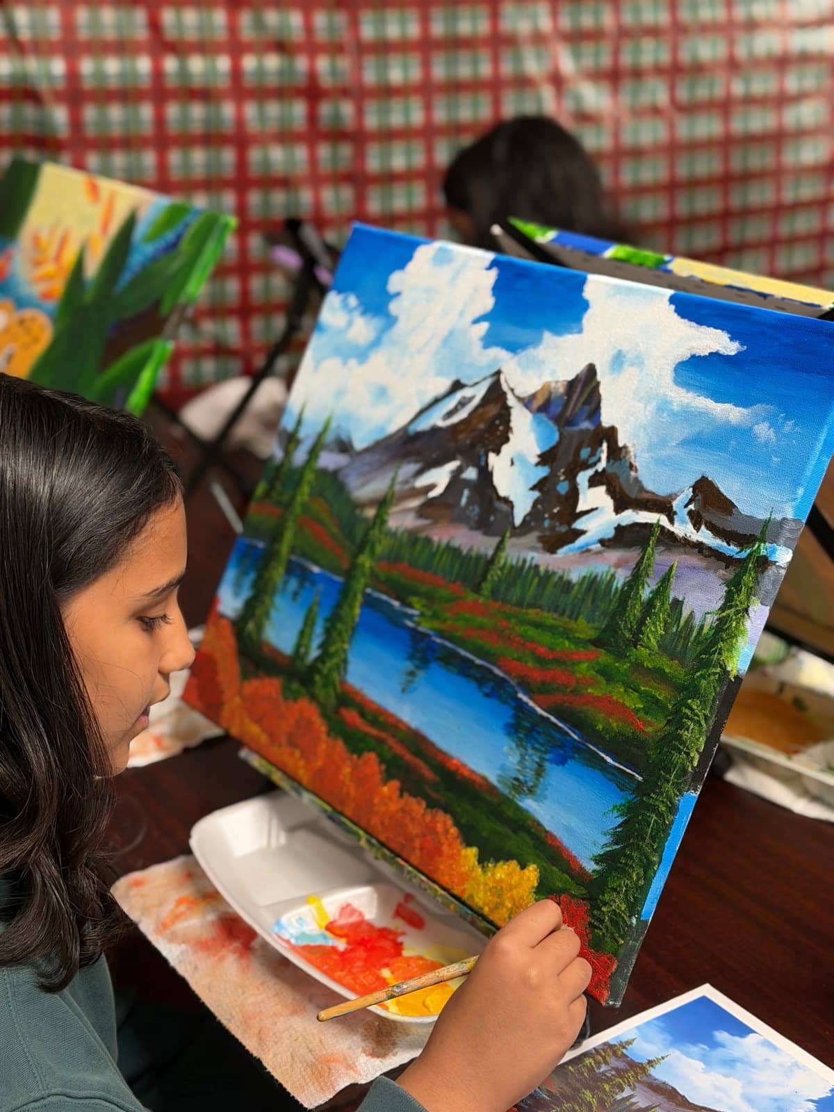 Student artwork and creative process at Imagination Arts.