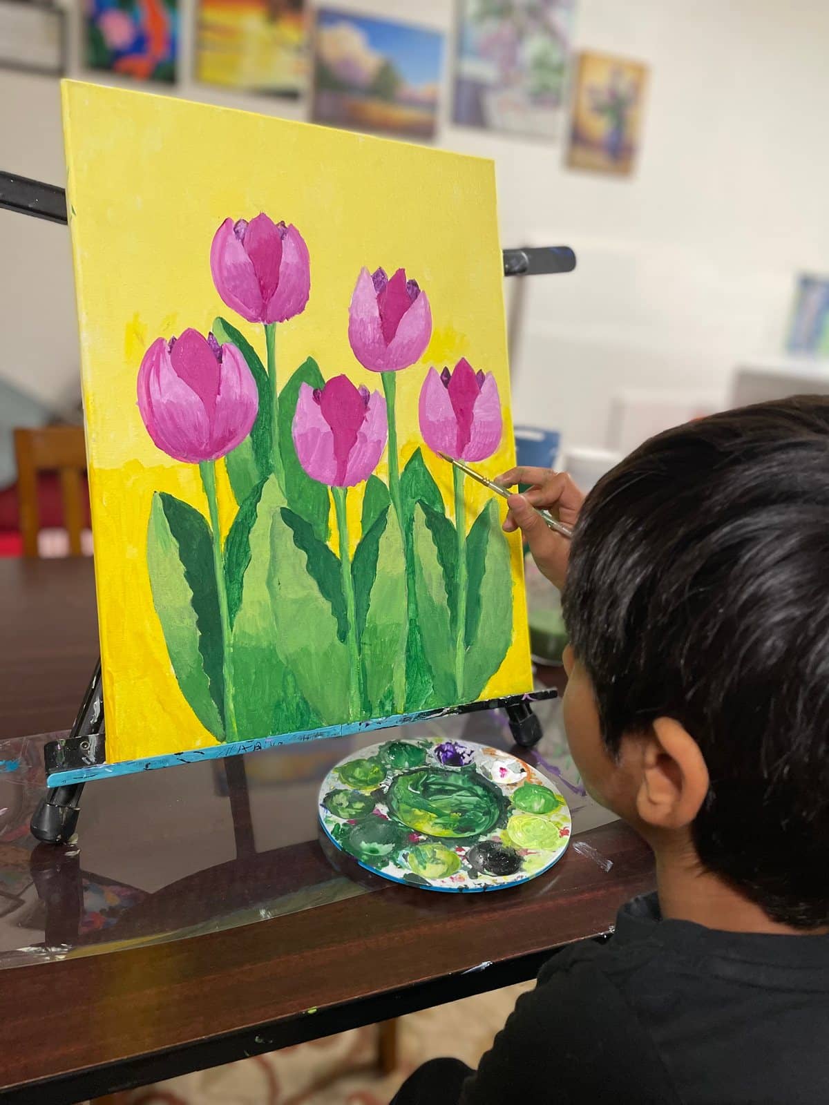 Student artwork and creative process at Imagination Arts.