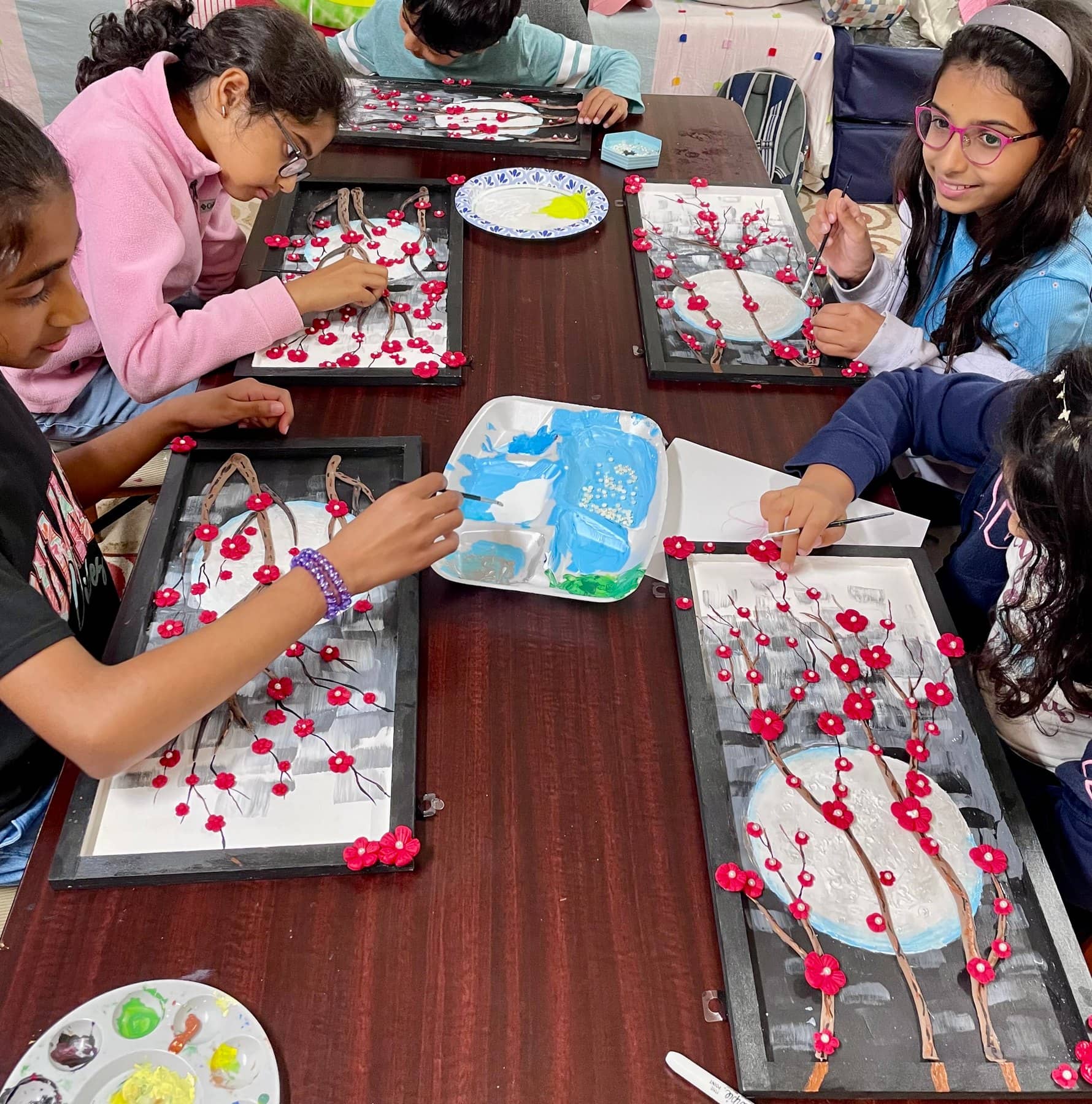 Student artwork and creative process at Imagination Arts.